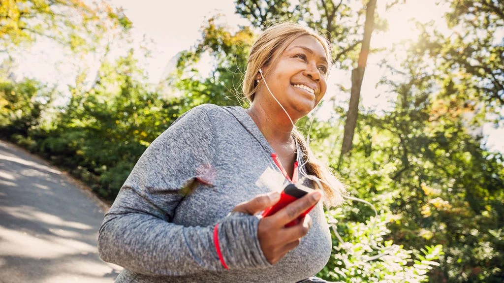 a woman increasing her ejection fraction by going for a run